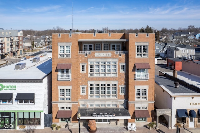 view of building exterior with a residential view