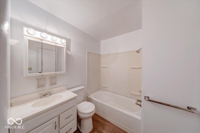 full bathroom featuring shower / tub combination, toilet, vanity, and wood finished floors