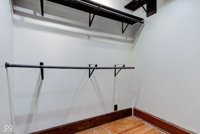 spacious closet with light wood-style flooring