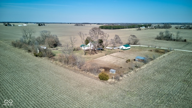 birds eye view of property featuring a rural view