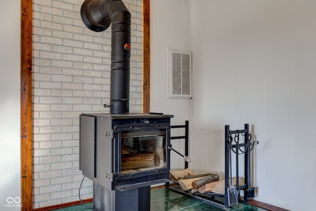 interior details with visible vents and a wood stove