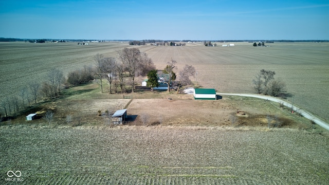 birds eye view of property featuring a rural view