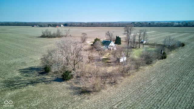 birds eye view of property with a rural view