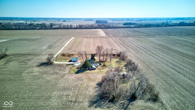 birds eye view of property featuring a rural view