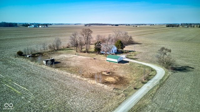 birds eye view of property featuring a rural view