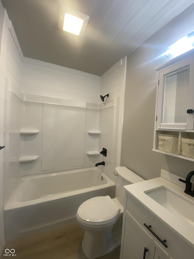 full bathroom featuring vanity, shower / tub combination, and toilet