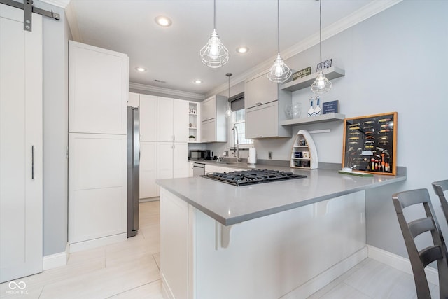 kitchen with ornamental molding, open shelves, decorative light fixtures, appliances with stainless steel finishes, and a peninsula