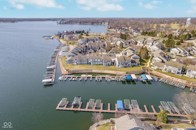 bird's eye view with a residential view and a water view