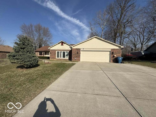 ranch-style house featuring a front yard, brick siding, concrete driveway, and an attached garage