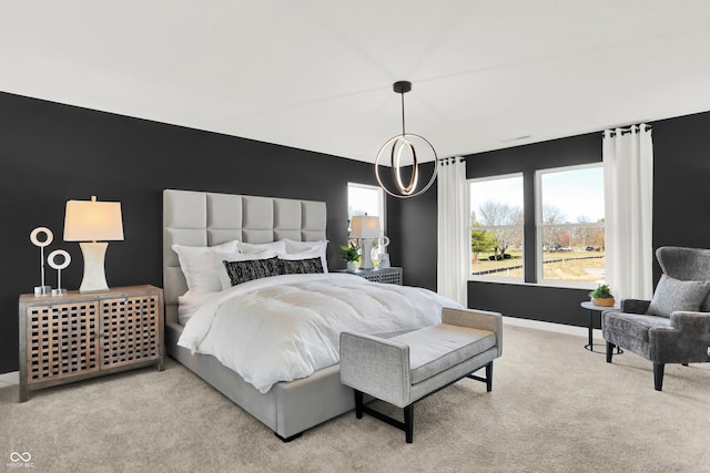 bedroom with baseboards and carpet floors