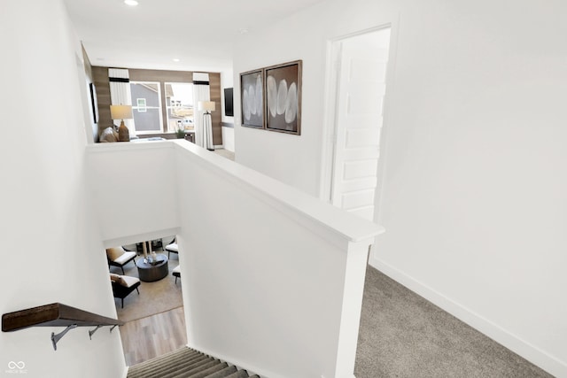 staircase with carpet flooring, recessed lighting, and baseboards