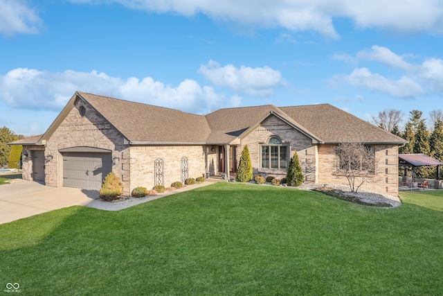 french provincial home with roof with shingles, concrete driveway, a front yard, a garage, and brick siding