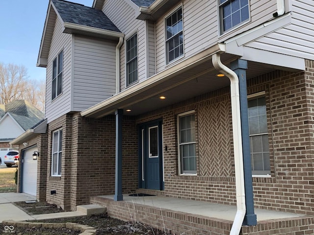 view of property exterior featuring brick siding