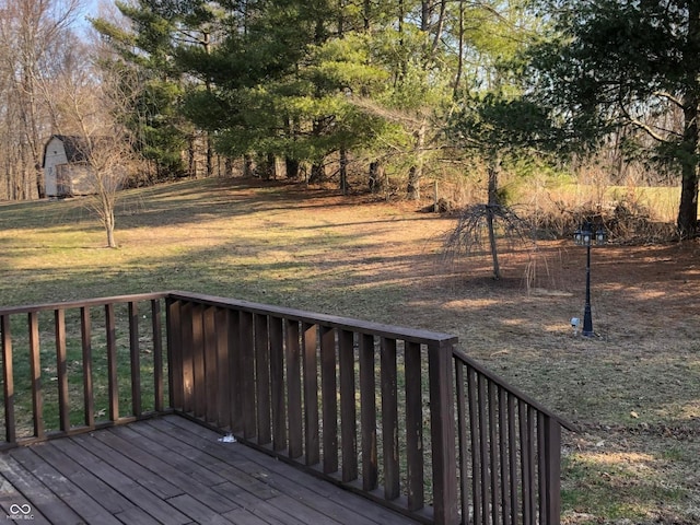 deck featuring a lawn