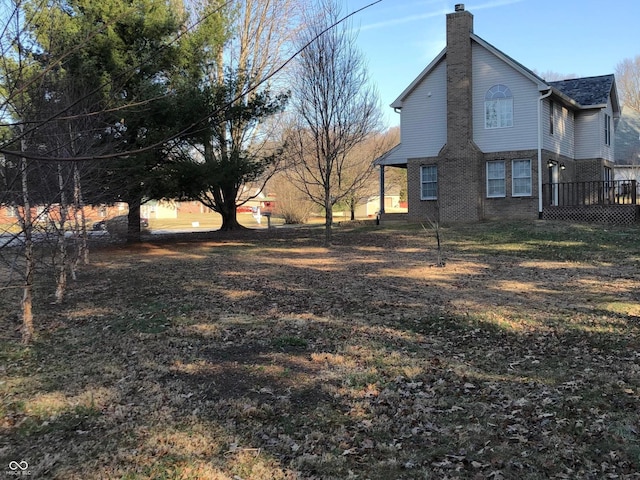 view of yard with a deck