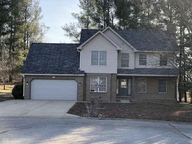 traditional-style home featuring brick siding, an attached garage, roof with shingles, and driveway