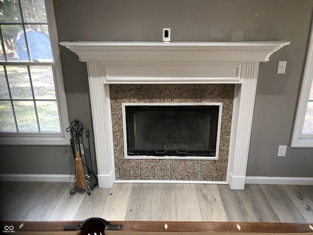 interior details with wood finished floors and baseboards