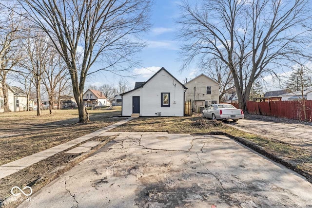 view of front of home with fence