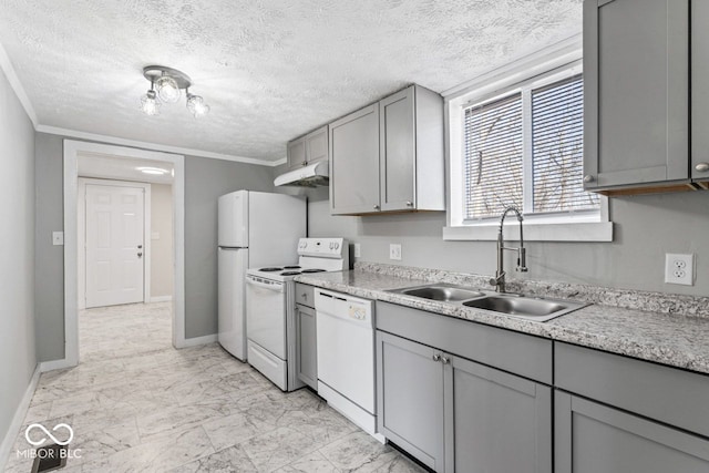 kitchen with under cabinet range hood, gray cabinets, marble finish floor, white appliances, and a sink