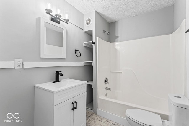 full bath with vanity, a textured ceiling, toilet, marble finish floor, and shower / bathtub combination