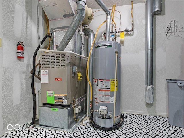 utility room featuring gas water heater and heating unit