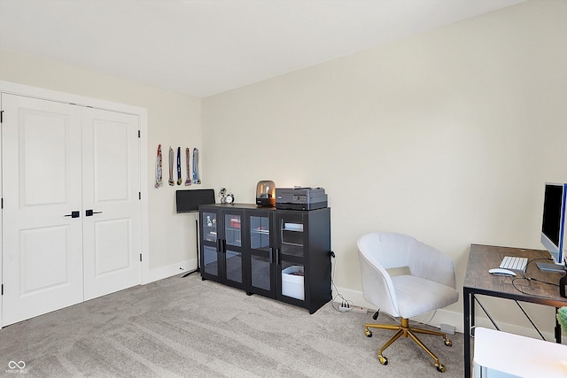 office with carpet flooring and baseboards