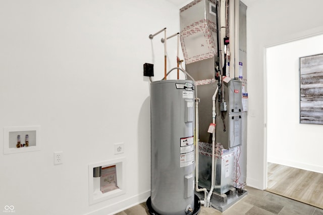 utility room featuring electric water heater