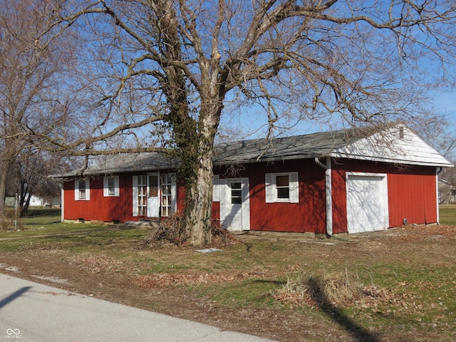 single story home with a garage