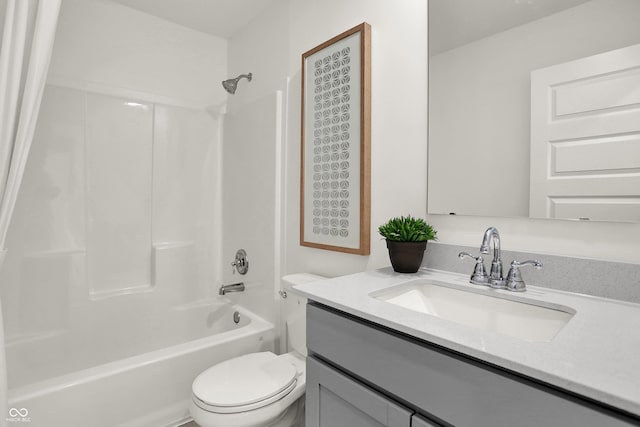 bathroom with vanity, shower / bathing tub combination, and toilet