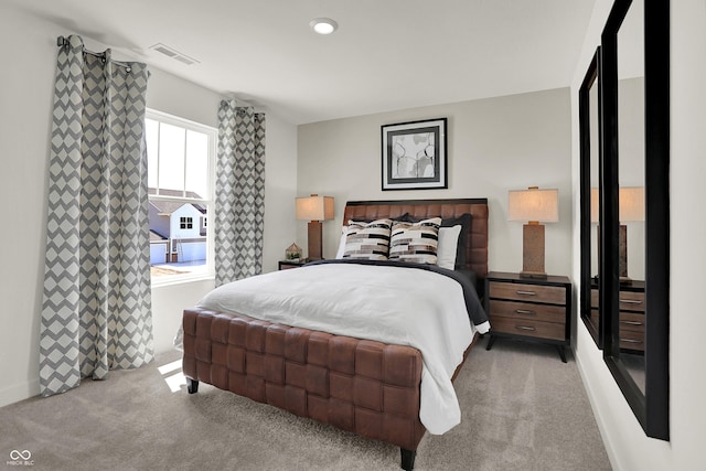 carpeted bedroom featuring visible vents and recessed lighting