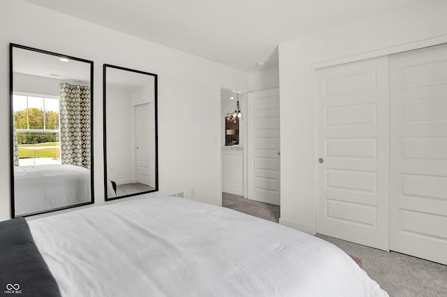 bedroom featuring visible vents and carpet floors