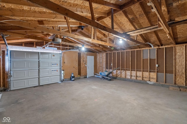 garage featuring a garage door opener