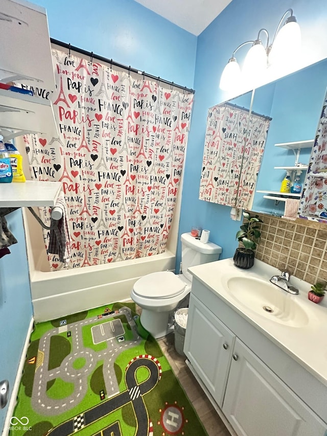 full bath with decorative backsplash, shower / tub combo with curtain, vanity, and toilet