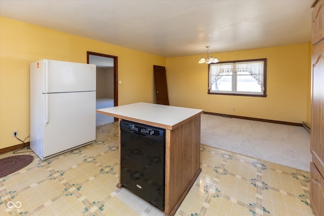 kitchen featuring a center island, a chandelier, dishwasher, light countertops, and freestanding refrigerator