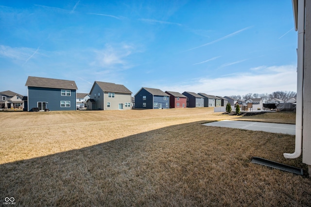 view of yard with a residential view