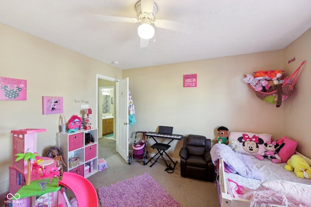 carpeted bedroom with a ceiling fan