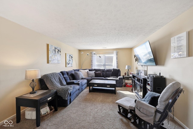 living area with baseboards, a textured ceiling, and carpet flooring