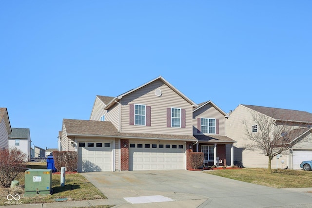 traditional-style house with brick siding, concrete driveway, and a garage