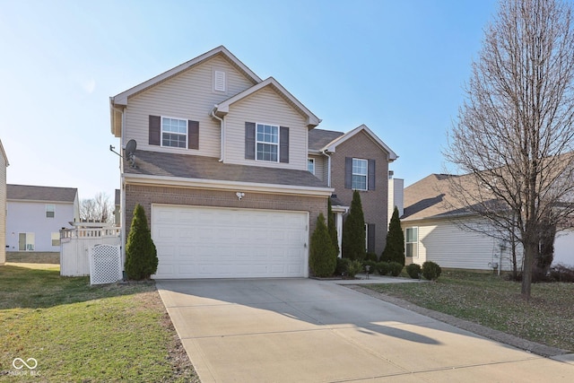 traditional home featuring brick siding, a front lawn, concrete driveway, and a garage