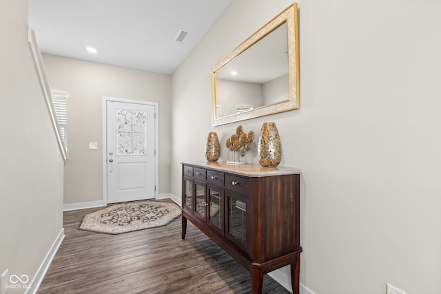 foyer featuring recessed lighting, wood finished floors, visible vents, and baseboards