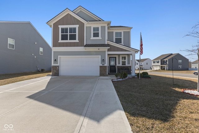 craftsman-style house with an attached garage, brick siding, board and batten siding, and driveway