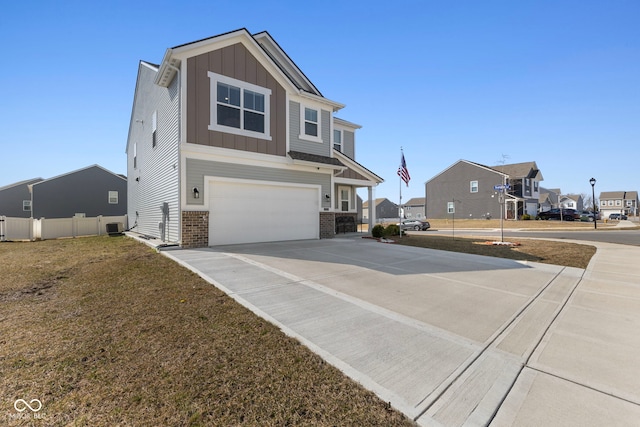 view of front of house featuring driveway, fence, board and batten siding, an attached garage, and brick siding