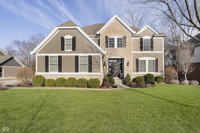 view of front facade with stone siding, stucco siding, and a front lawn