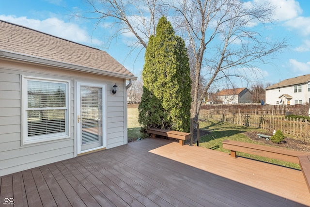 wooden deck featuring fence