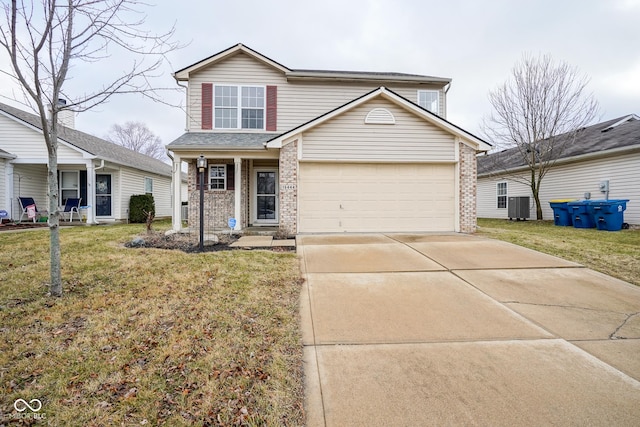 traditional home with brick siding, central AC unit, driveway, and a front lawn