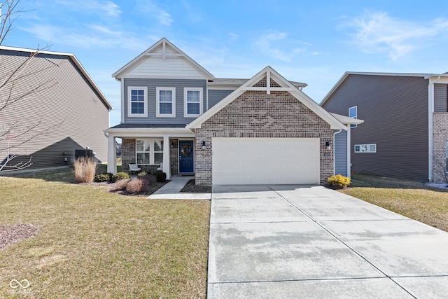 view of front of home with a front yard, an attached garage, brick siding, and driveway