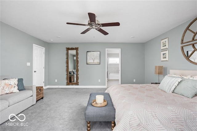 carpeted bedroom featuring ceiling fan, ensuite bathroom, and baseboards