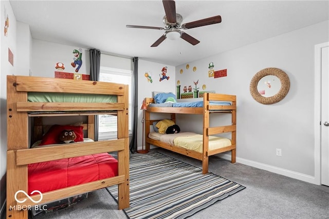 carpeted bedroom with a ceiling fan and baseboards