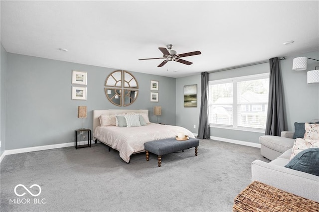 bedroom featuring baseboards, carpet floors, and ceiling fan