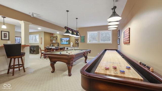 recreation room with billiards, plenty of natural light, light colored carpet, and baseboards